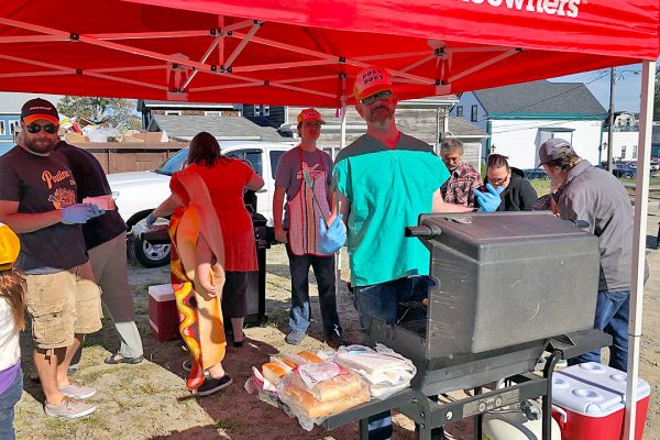 Queen General Hospital doctors serve the community – by cooking hot dogs!